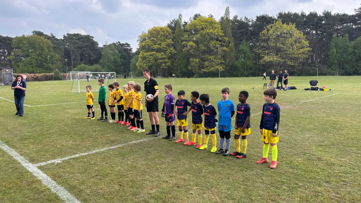 Lining up for the handshake before kick-off