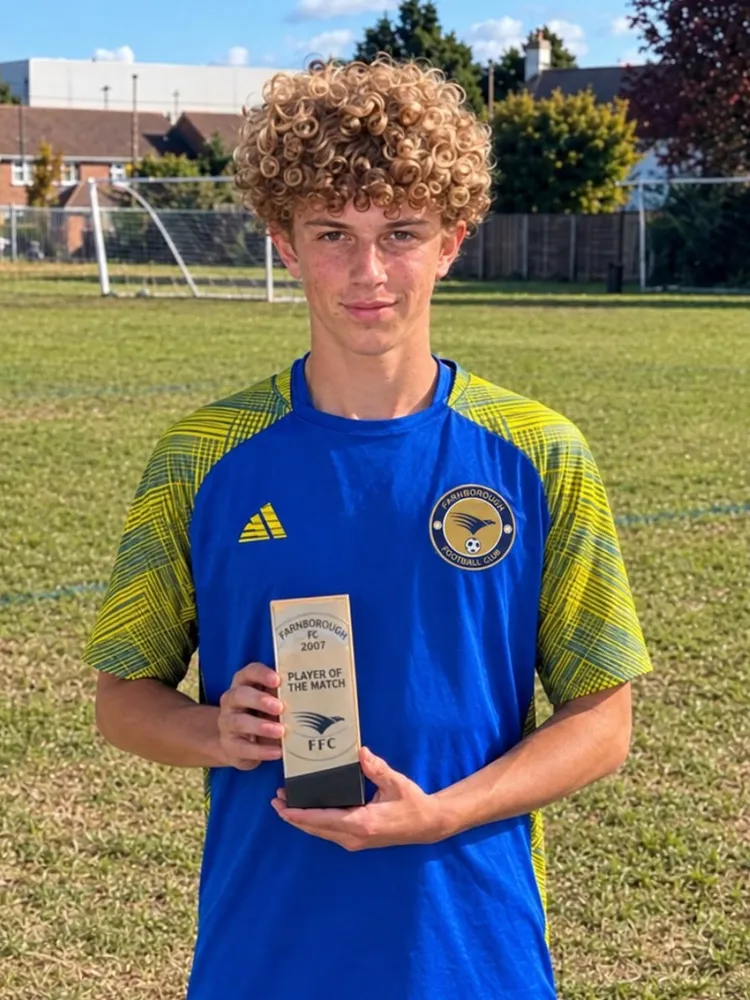 Tight curls, a blue and yellow top and a steady look at the camera, the Player of the Match block held in both hands